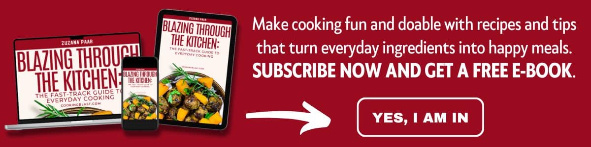 A promotional banner for the e-book "Blazing Through the Kitchen," showing a laptop, tablet, and phone with the book cover, and a call-to-action button reading "Yes, I am in.