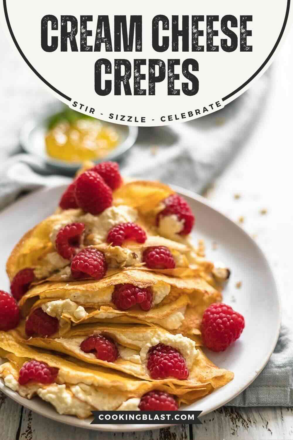 Cream cheese crepes topped with fresh raspberries.