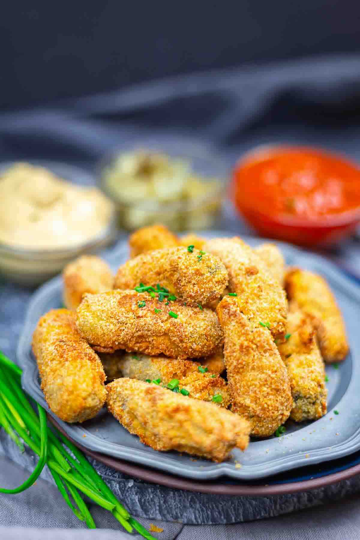 Oven baked gherkins with dips and herbs.