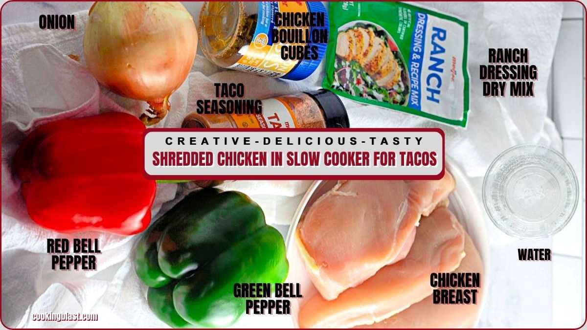 Ingredients for slow cooker shredded chicken tacos are laid out, including chicken breast, peppers, onion, taco seasoning, ranch mix, bouillon cubes, and water.