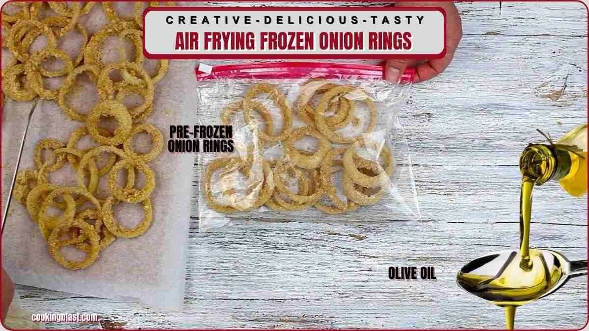 A baking sheet with pre-frozen onion rings, a ziplock bag of frozen onion rings, and olive oil being poured from a spoon on a wooden surface.