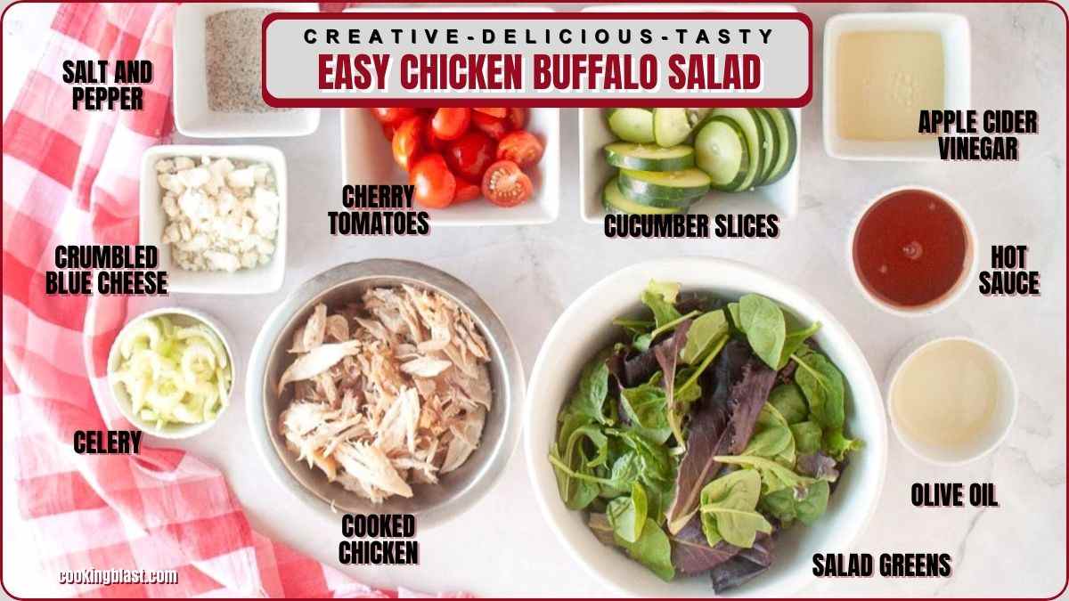 Overhead view of ingredients for chicken buffalo salad, including cooked chicken, salad greens, cherry tomatoes, cucumber slices, celery, blue cheese, olive oil, hot sauce, vinegar, salt, and pepper.