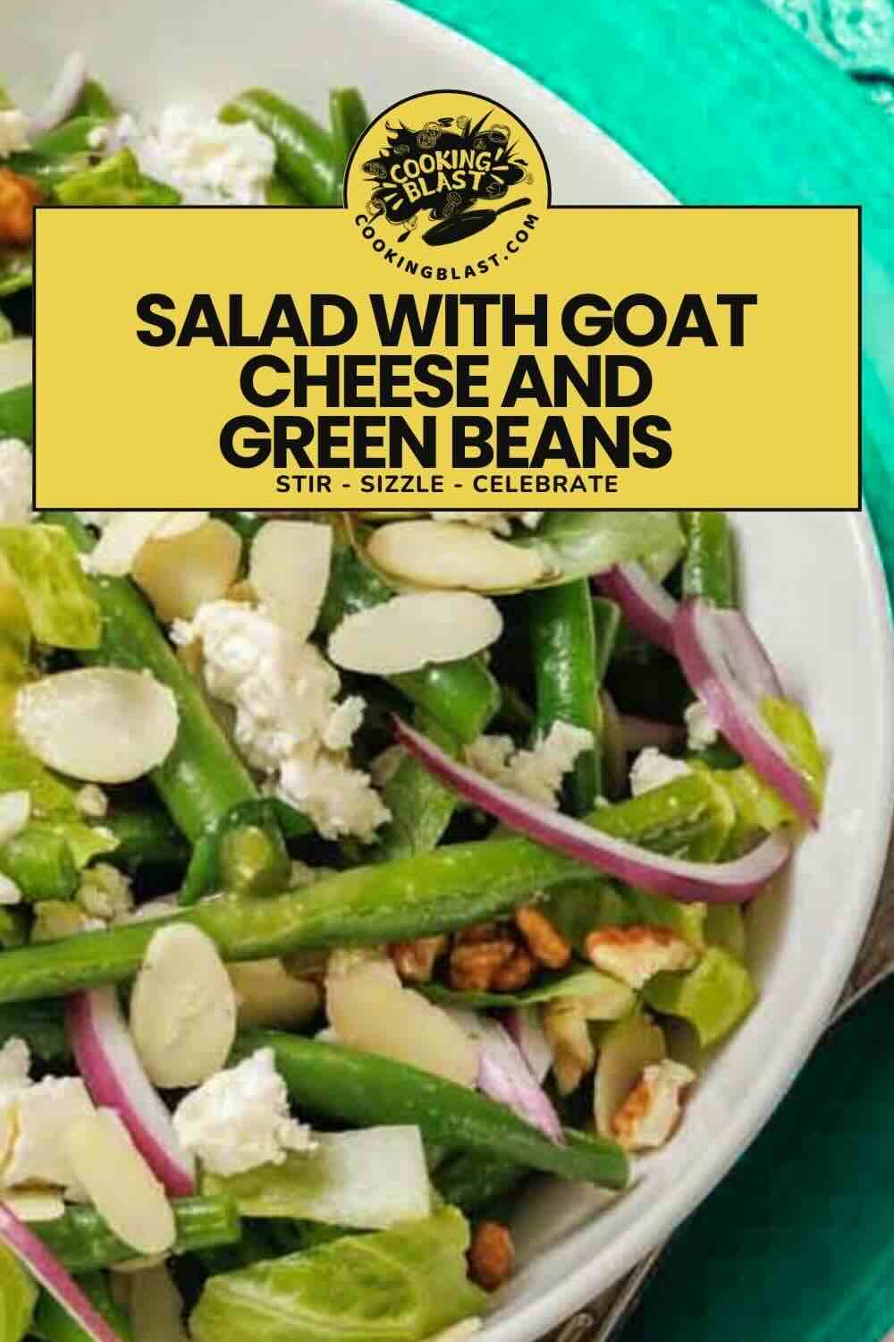 A bowl of salad containing green beans, goat cheese, sliced almonds, red onions, and leafy greens on a turquoise surface. A label reads "Salad with Goat Cheese and Green Beans.