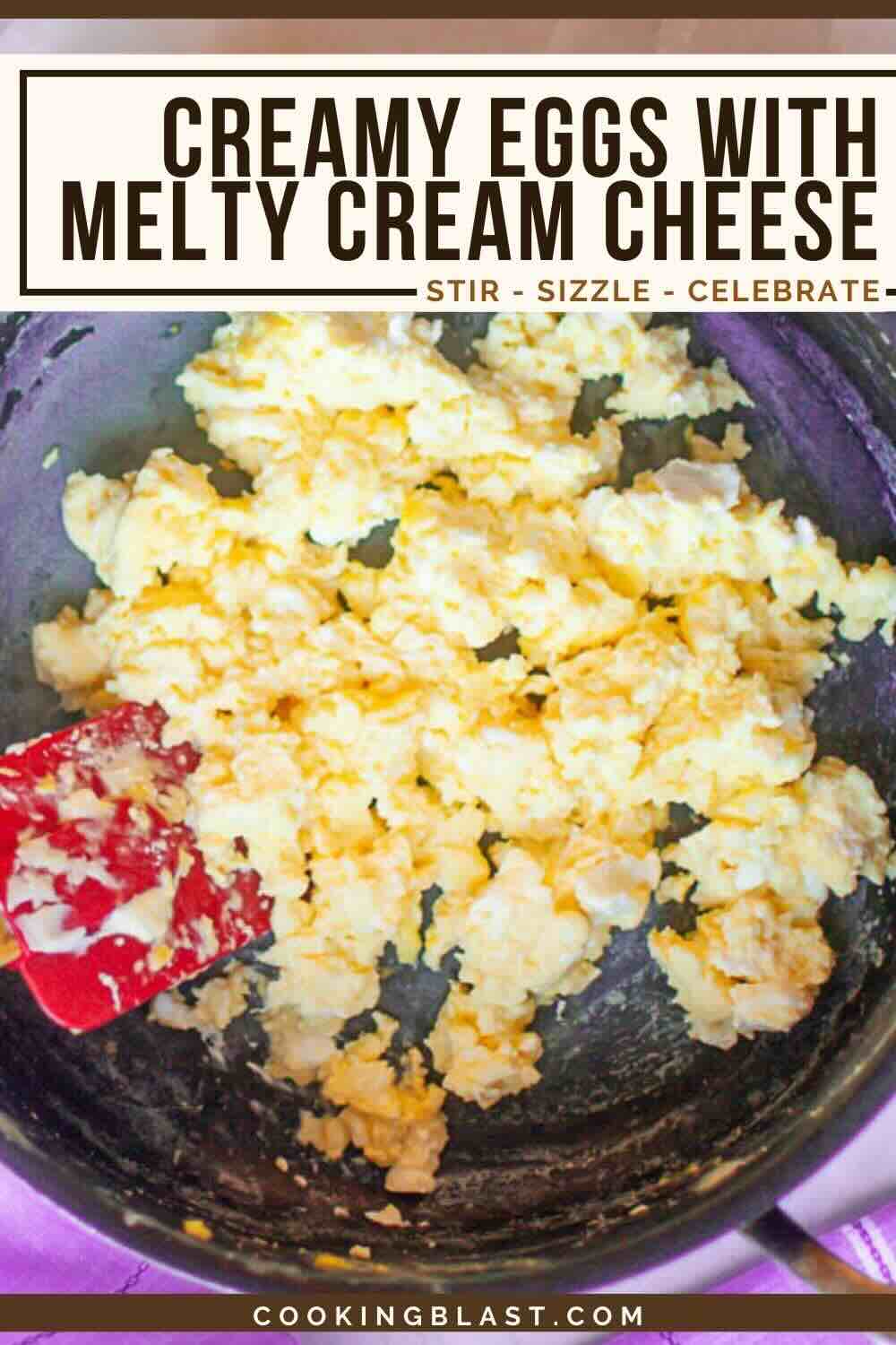 Scrambled eggs with cream cheese being stirred in a skillet with a red spatula; text overlay reads "Creamy Eggs with Melty Cream Cheese.